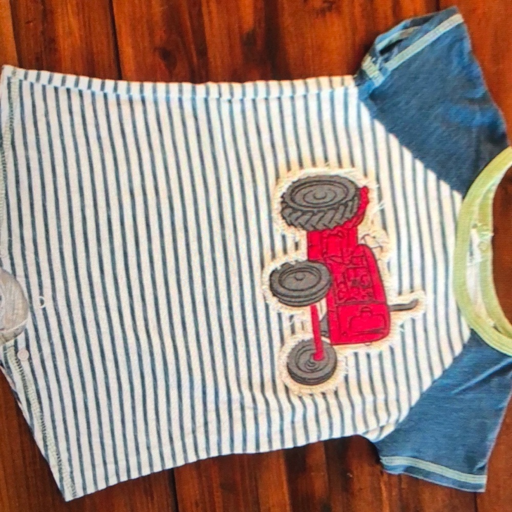 Striped Baby onesie With red tractor